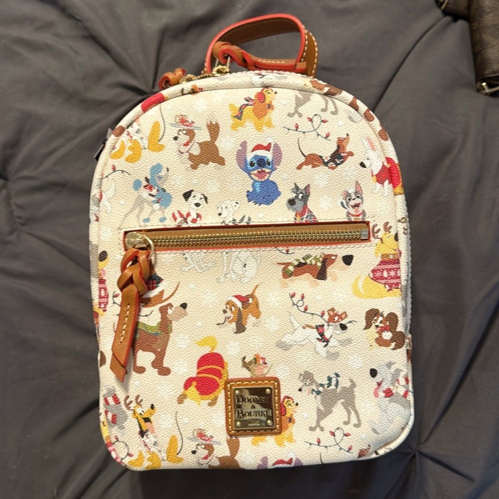 NWT. Disney Dogs Dooney & Bourke Bag - Santa Tails Backpack. Disney leather bag